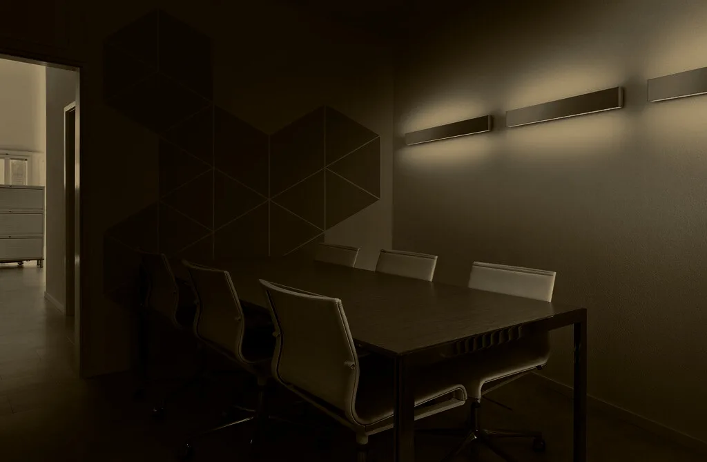 A quiet meeting room lit from one side
